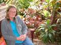 Helen Curran in tropical garden